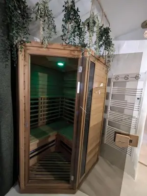 a walk in shower with plants on top of it at La Galatée, Balnéo et Sauna privatifs in Saint-Saturnin-lès-Avignon