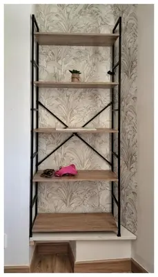 a shelf in a room with wooden shelves at Le Nid plein centre in Salon-de-Provence