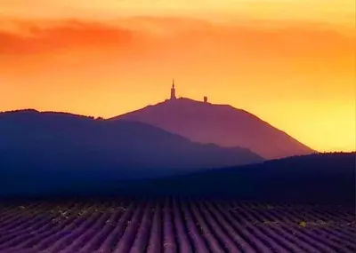 a view of a hill with a church on top of it at Chambre DURFORT in Sault-de-Vaucluse