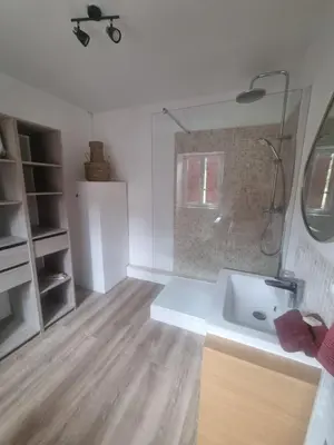 a small bathroom with a sink and a shower at Chambre DURFORT in Sault-de-Vaucluse