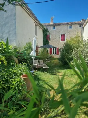 a view of a house from the garden at Chambre DURFORT in Sault-de-Vaucluse