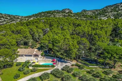 an aerial view of a house with a pool at Villa Cheval Blanc by Villa Plus in Cheval-Blanc
