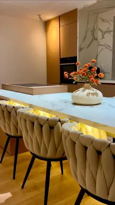 a table with a bowl of lemons on it at Appart 'COSY avec Piscine Chauffée Privée in Salon-de-Provence