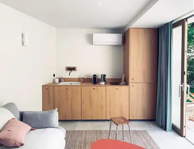 a bathroom with a white sink and a mirror at Studio with garden and pool in Aix-en-Provence