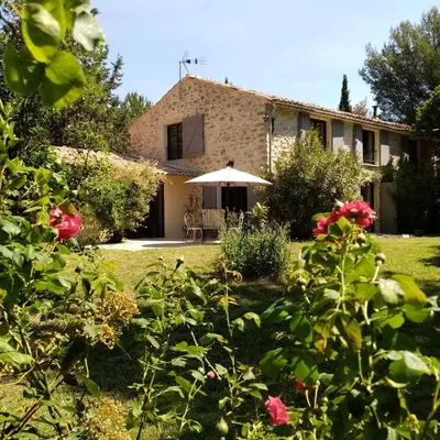 a view of the house from the garden at La ferme du Loup in Cucuron