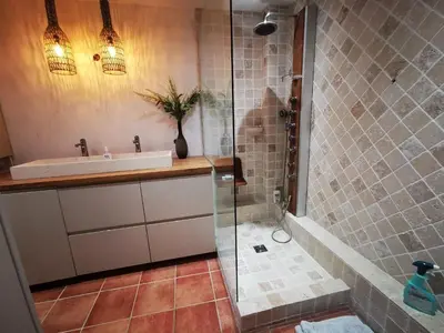 a bathroom with a sink and a shower at Aix centre, 2 room apartment garden, parking in Aix-en-Provence