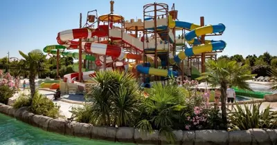 a water park with a large water slide at Résidence Les Salettes in Mormoiron
