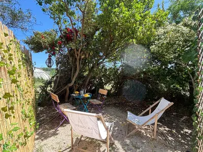 a bedroom with a bed with two stuffed animals on it at MAYA l Studio l Super Wifi & Parking Gratuit l Vue Panoramique Sainte-Victoire in Aix-en-Provence