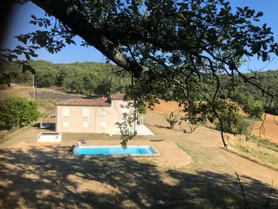 a house with a swimming pool in a yard at les Claveaux in Montfuron