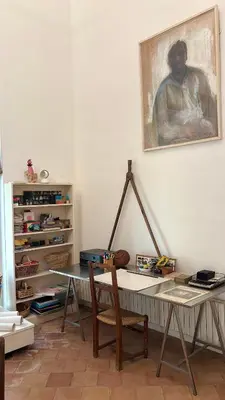 a room with a desk and a painting on the wall at Mas exceptionnel à Lagnes, Provence in Lagnes
