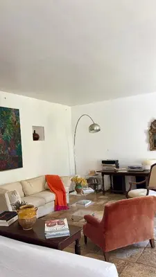 a living room with a couch and a table at Mas exceptionnel à Lagnes, Provence in Lagnes
