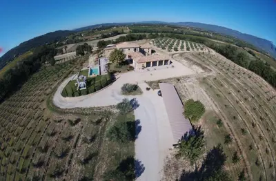 an aerial view of a house on a vineyard at Bastide Saint Maurin in Ansouis