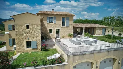 an aerial view of a house with a patio at Bastide Saint Maurin in Ansouis