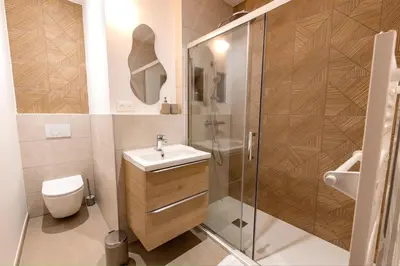 a bathroom with a toilet and a sink and a shower at Charme et Modernité au coeur d'Aix & Cours Mirabeau in Aix-en-Provence