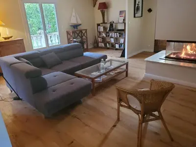 a living room with a couch and a fireplace at Charming house near village with 5-minutes pedestrian access to old town in Venelles