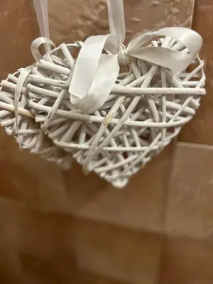 a heart shaped basket with utensils in it at Le Paradis au centre du Vaucluse in Saumane-de-Vaucluse