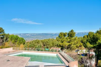 a swimming pool on the roof of a house at Les Coteaux de Pont Royal en Provence - maeva Home - Appartement climatisé 3 pièces 6 personnes - Prestige MAE-6331 in Mallemort