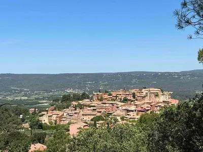 a small town on a hill with houses at Apartment Roussillon village Ocre Air conditioning in Roussillon