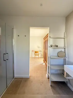 a bathroom with white walls and a ladder in a room at EcoLodge romantique proche Lourmarin Piscine Privée Borne recharge in Puyvert