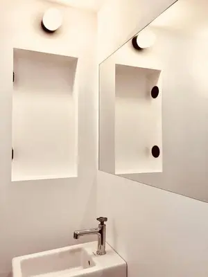 a bathroom with a sink and a mirror at Le Poulailler, private house with garden and parking in Aix-en-Provence