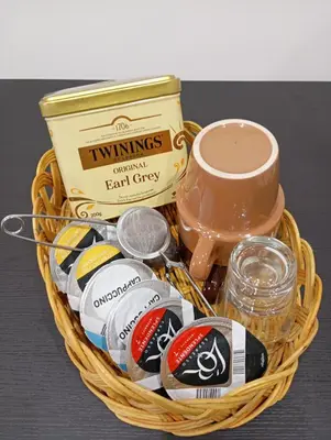 a basket filled with candy and a jar of coffee at studio in Morières-lès-Avignon