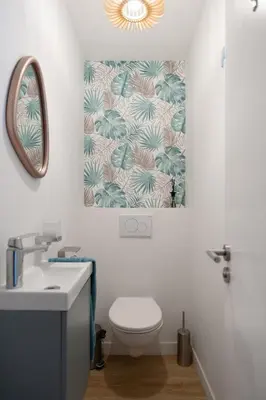 a bathroom with a toilet and a sink and a mirror at Olyma - Spacieuse - Familiale - Piscine & Climatisé in Éguilles