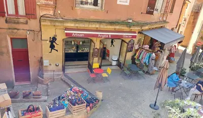 an overhead view of a store with tables and chairs at Roussillon House in Roussillon