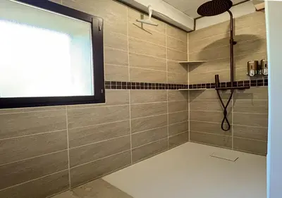 a bathroom with a sink and a toilet and a mirror at Nature&détente au pied du Mont Ventoux parking privé gratuit in Carpentras