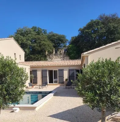 a house with a swimming pool in front of it at L'Orée du Ventoux - Crillon-le-Brave in Crillon-le-Brave