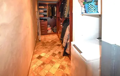 a hallway with a tiled floor and a refrigerator at 2 Bedroom Lovely Home In Vedène in Vedène