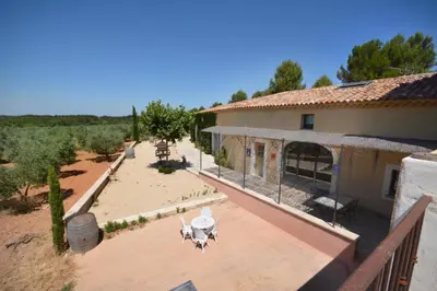 an aerial view of a building with a patio at Le domaine de Villemus chambre d'hote in Jouques