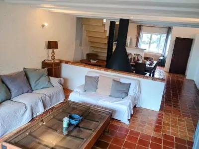 a living room with two couches and a coffee table at Gîte Le Provence Spacieux 100m2 in Saumane-de-Vaucluse