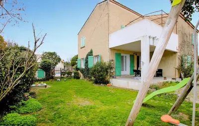 a house with a yard in front of it at Awesome Apartment In Carpentras in Carpentras