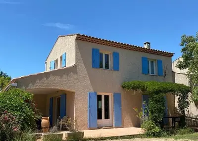 a small house with blue shutters on it at Villa climatisée dans Domaine privé Aix en Provence in Aix-en-Provence