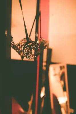 a metal object is hanging on a wall at Osez! Le fruit défendu Loveroom Carpentras in Carpentras