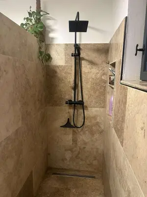a shower in a bathroom with a shower at charmante petite maison - piscine hors sol - proche Avignon in Avignon