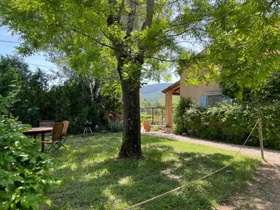 a field of lavender with mountains in the background at Historic Bastide With Private Pool In The Luberon in Céreste