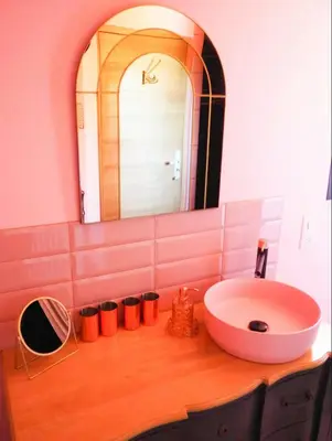 a bathroom with a sink and a mirror at Peaceful Retreat In The Heart Of Luberon in Roussillon