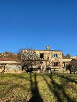 an old house in the middle of a field at Grand Appartement Provençal in Manosque