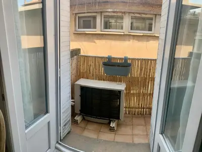 a view from a window of a balcony with a sink at Appartement cosy lumineux et calme in Apt