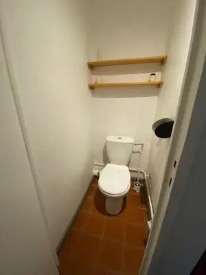 a small bathroom with a toilet in a room at Studio avec balcon sur cour in Aix-en-Provence
