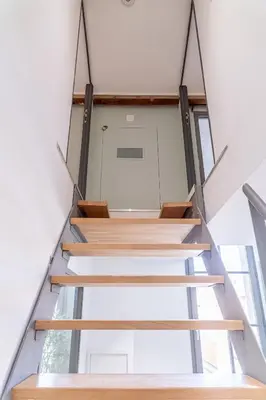 a view of the stairs in a house at T4 d'exception à Aix in Aix-en-Provence