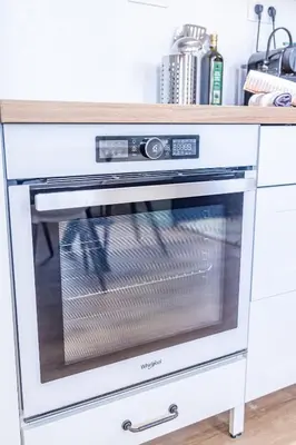 a microwave oven sitting inside of a kitchen counter at T4 d'exception à Aix in Aix-en-Provence