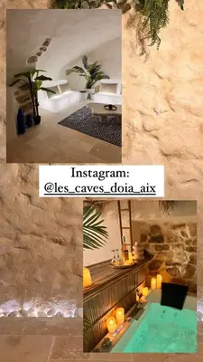 a bathroom with a sink and a mirror at Les Caves d 'Oía in Aix-en-Provence
