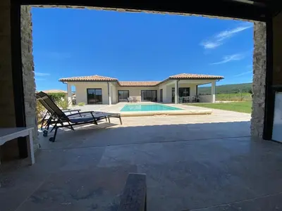 a view from the patio of a house with a pool at Villa with pool in Provence bij de Mont Ventoux in Blauvac
