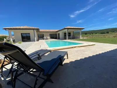 a villa with a swimming pool and a house at Villa with pool in Provence bij de Mont Ventoux in Blauvac