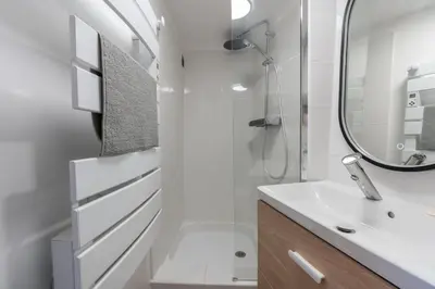 a bathroom with a sink and a shower at Studio climatisé plein centre 4eme étage in Aix-en-Provence