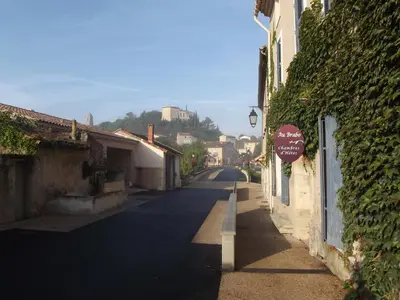 a street with a stop sign on the side of a building at Chambres et table d'hôtes Au Brabo in Mormoiron