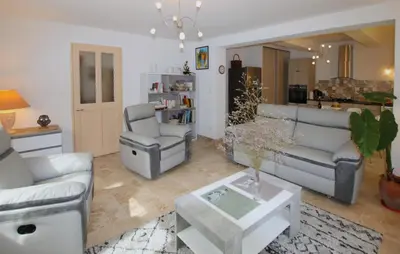a living room with two couches and a table at Amazing Home In Lagnes in Lagnes