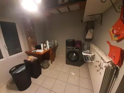 a laundry room with a washer and a washing machine at 4 bedroom villa pool entire place in Salon-de-Provence